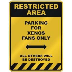  RESTRICTED AREA  PARKING FOR XENOS FANS ONLY  PARKING 