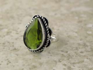 size 6    silver (RING) featuring **  kiwi green peridot like quartz 