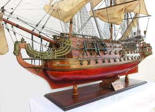  level tall ship model is a solid wood base with a brass name plate