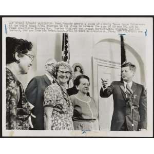 President Kennedy greets group of elderly Peace Corps volunteer,White 