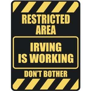   RESTRICTED AREA IRVING IS WORKING  PARKING SIGN