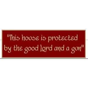  This house is protected by the good Lord and a gun