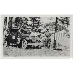    Reprint Group portrait with car and flag. 1929