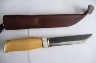 Handmade in Kauhava, this survival bushcraft puukko knife embodies 