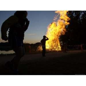 Denmark, Gentofte, Silhouette of Children by Burning Fire at Gentofte 