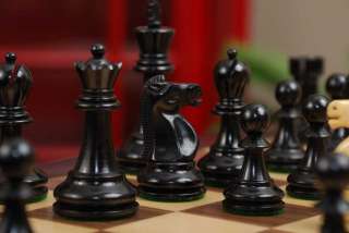 the reykjavik ii chess set boxwood ebonized on tirior chessboard