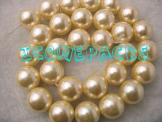 wholesale 15.5 14mm AAA golden shell pearl round beads  