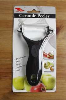   Kitchen Advanced White Ceramic Peeler Paner with ABS Black Handle