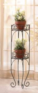   shelf plant stand. A graceful addition for indoors or out; shelves