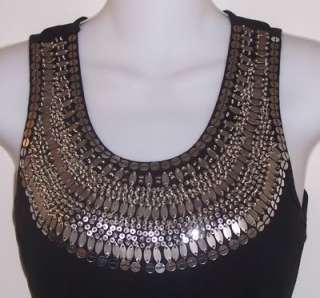 25 ribbed, scoop neck tank is beautifully hand embellished with 
